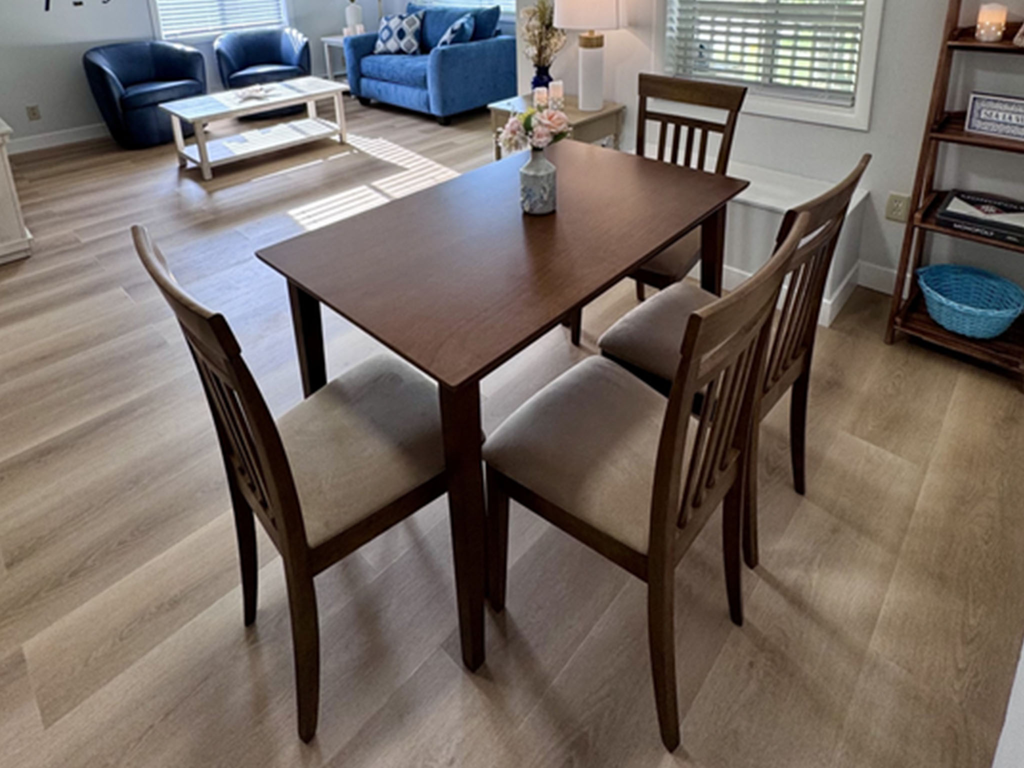 Elegant dining room with warm wood furniture and natural lighting