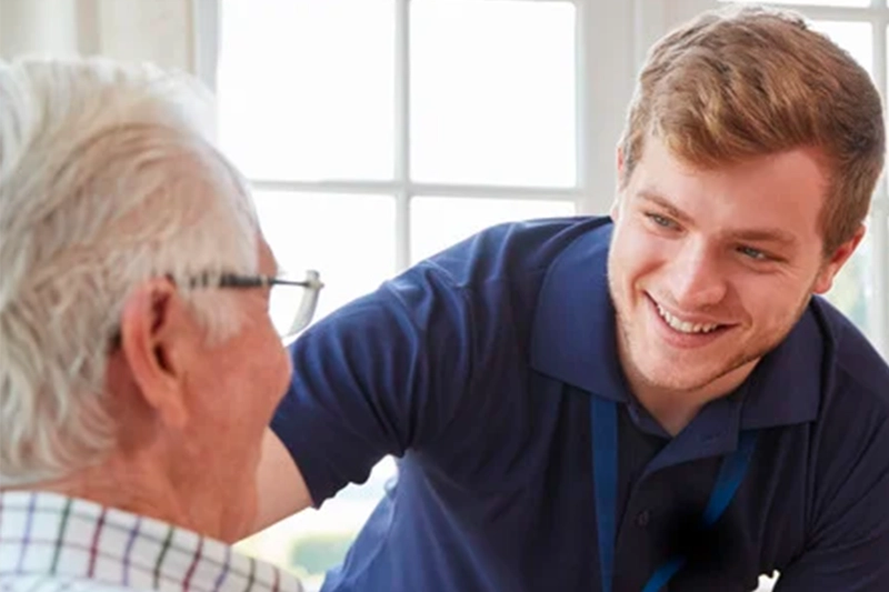 Compassionate caregiver spending quality time with resident